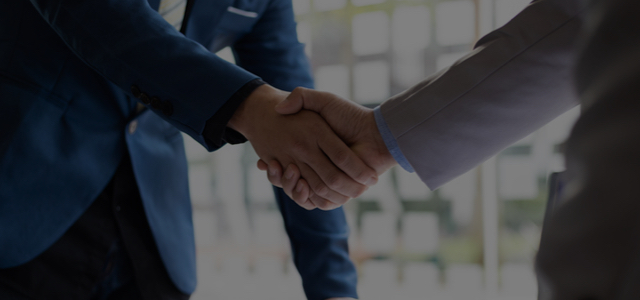 business men shaking hands