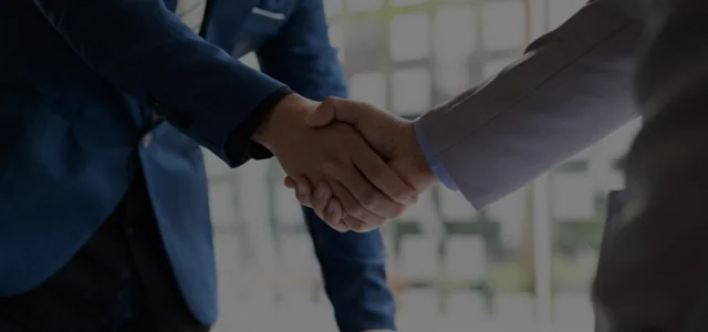 business men shaking hands